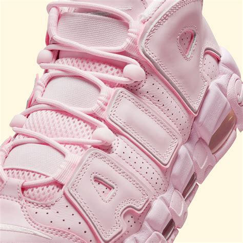 nike uptempo pink and white